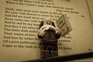 Lego figure holding book poem - a poem free wallpaper