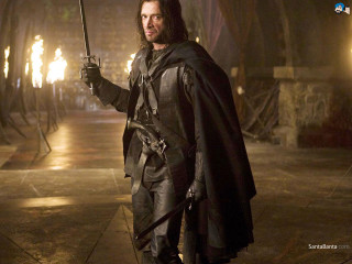 Man costume sword dark room 2 - a man in a costume holding free wallpaper