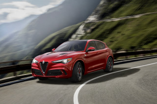 Red alfa car driving mountain - alesso baldovinetti free wallpaper