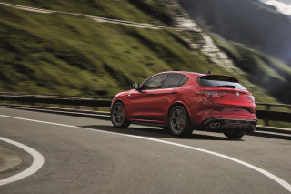 Red alfa mountain road valley - a view of a valley and mountains free wallpaper