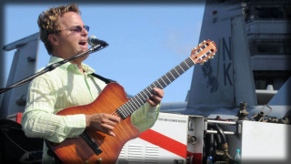 Man playing guitar microphone plane - a man playing free wallpaper