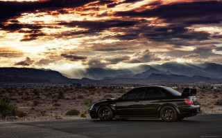 Car parked desert mountains clouds 2 - expressionism free wallpaper