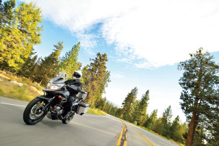 Motorcycle road trees hill sky - dan scott free wallpaper