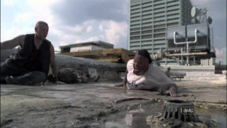 Man woman laying ground building - movie scene free wallpaper