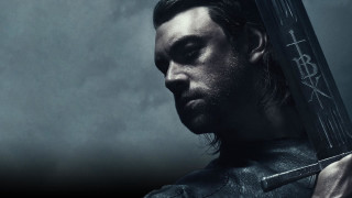 Man sword dark sky clouds - a dark sky free wallpaper