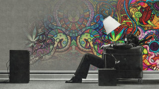 Man sitting chair wall painting - a lamp free wallpaper