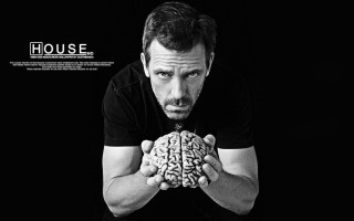 Man holding brain black background 2 - expressive free wallpaper