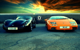 Sports cars parking lot sunset 2 - two sports car free wallpaper for desktop