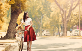 Woman red skirt bike basket - a bike free wallpaper