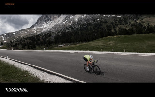 Man riding bike road mountain - carlo carlone free wallpaper