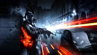 Man gasmask cityscape night explosion - a gun in a city street free wallpaper