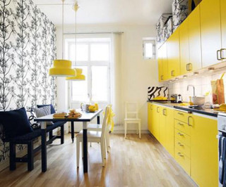Yellow cabinets kitchen table chairs - a pop art painting free wallpaper