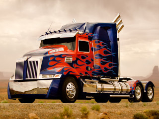 Semi truck flames desert road - a large semi truck free wallpaper