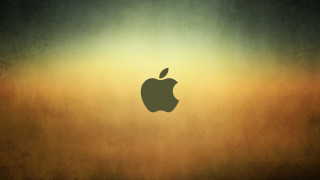Apple logo brown yellow background - the right side of the image free wallpaper