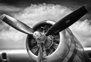 Propeller plane side wing cloudy - a propeller plane free wallpaper