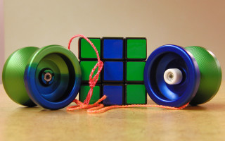 Rubik cube with wheels and - cubofuturism free wallpaper