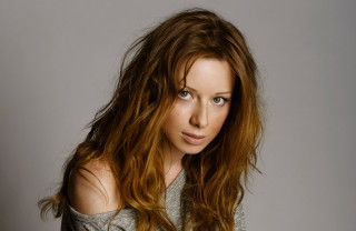 Woman long hair posing gray 2 - free portrait wallpaper for desktop