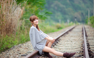 Woman sitting train track legs - chen lin free wallpaper