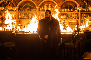 Man standing bar fire background - a bar free wallpaper