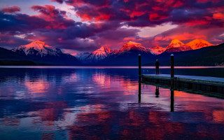 Sunset lake mountains dock mystical - a beautiful sunset over a lake free wallpaper