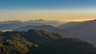 Mountain range sunset bird horizon - a view of a mountain range free wallpaper