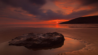 Rock beach sunset cloudy sky 2 - rich moody colour free wallpaper