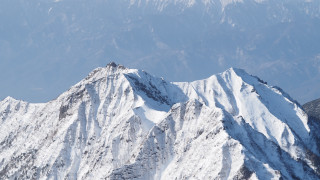 Mountain snowy peak plane sky - peak in the distance free wallpaper for desktop
