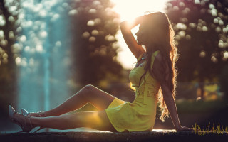 Woman yellow dress sitting backlit - a yellow dress free wallpaper