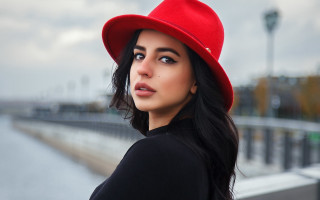 Woman red hat bridge portrait - black shirt free wallpaper
