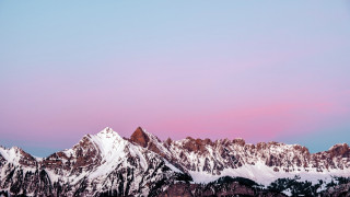 Mountain range pink sky snow 2 - a few snow covered mountains free wallpaper