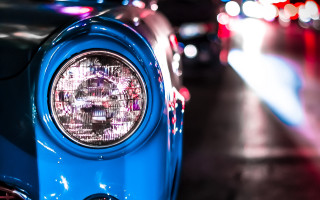 Blue car headlight shallow depth - a blue car free wallpaper for desktop