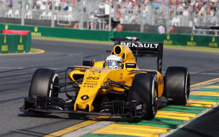 Yellow racecar crowd stands man - a yellow race car free wallpaper