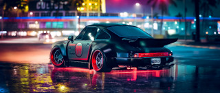 Black car wet street night - octane free wallpaper