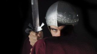 Medieval helmet sword armor portrait - a man in a helmet holding free wallpaper