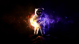Man space suit glowing light - a man in a space suit free wallpaper