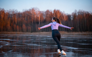 Woman skating frozen lake winter - fabien charuau free wallpaper