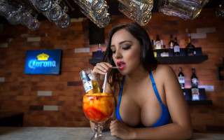 Woman bluebikini drinking crown bar - a crown free wallpaper