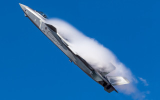 Jet flying blue sky smoke 4 - a cloud of smoke free wallpaper