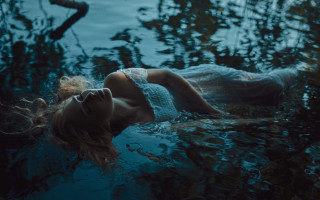 Floating woman white dress underwater - her eye free wallpaper for desktop