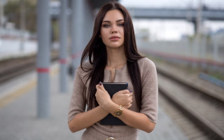 Woman book train platform bokeh - free technology wallpaper