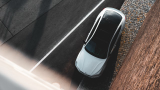 White car parking lot sidewalk - a white car free wallpaper