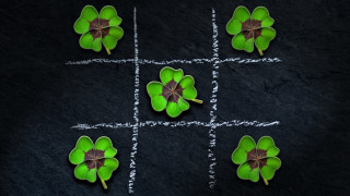 Four leaf clovers black chalk - a black surface free wallpaper for desktop