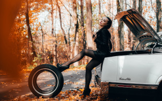 Woman black dress heels car - the ground in front free wallpaper for desktop