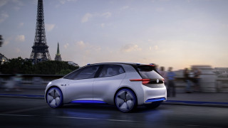 White car tower city scene - a street next free wallpaper