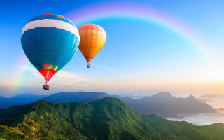 Hot air balloons mountain rainbow - a rainbow in the sky above free wallpaper