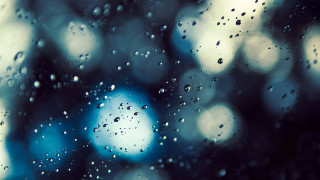Rainy window blue lights blurry - a close up of a rain free wallpaper