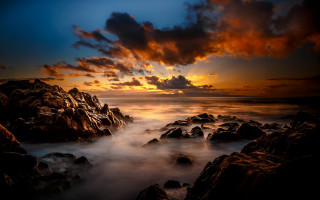 Sunset rocky beach clouds ocean - a few rock free wallpaper