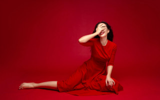 Woman red dress sitting portrait 2 - her eye free wallpaper for desktop