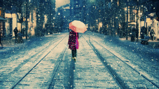 Woman walking umbrella snow night 2 - an umbrella in the snow free wallpaper