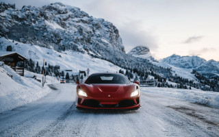Red sports car snowy mountains - a snowy road free wallpaper